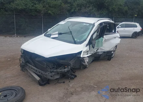 2017 Ford Escape Titanium z USA, uszkodzony, nr VIN 1FMCU0J95HUC14271